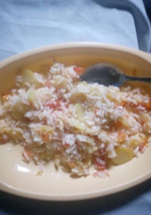 A picture of Fried rice and potatoes.