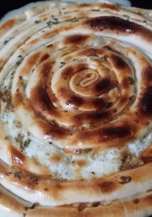 Una foto de Arrolado de pascualina de lechuga, jamón y queso 🧀 😋