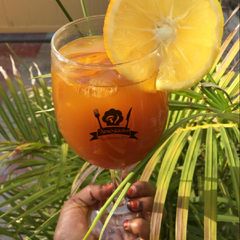 A picture of Orange tamarind juice.