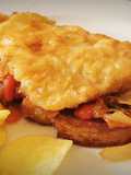 Tostada de Merluza rebozada con Piperrada