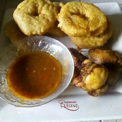 A picture of Funkaso served with chicken and soup.