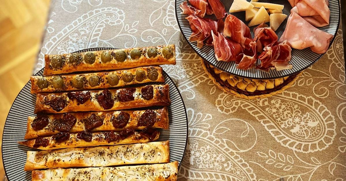 Antipasto italiano panecitos de sabores con tabla de embutidos Receta