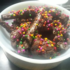 A picture of Colourful chocolate logs.