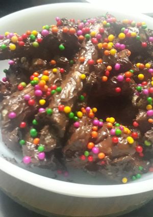 A picture of Colourful chocolate logs.