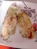 Corvina en finas hierbas al Ajillo