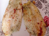 Corvina en finas hierbas al Ajillo