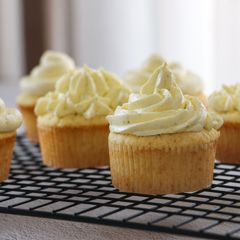 A picture of Greek Yogurt and Lime Cupcakes with Berries Jam and Cream Cheese Frosting.