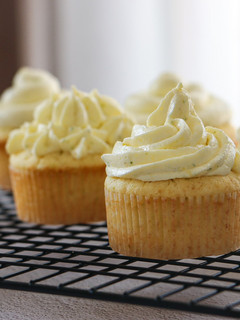 A picture of Greek Yogurt and Lime Cupcakes with Berries Jam and Cream Cheese Frosting.
