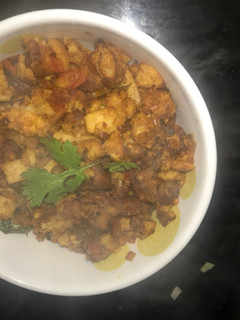 A picture of Bread Upma- leftover sides of the bread- breakfast dish.