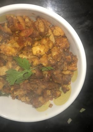 A picture of Bread Upma- leftover sides of the bread- breakfast dish.