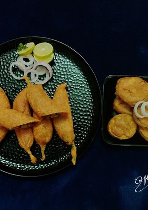 A picture of Stuffed Paneer Mirch bhajiya and baingan bhajiya.