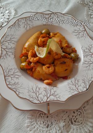 صورة لوصفة طاجين بحريات مع محشي كلمار وبطاطس🦐🦭
