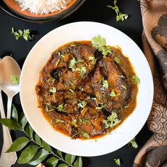 A picture of Gongura Chepala Pulusu (Andhra style Fish Curry with Sorrel Leaves).