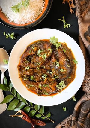 A picture of Gongura Chepala Pulusu (Andhra style Fish Curry with Sorrel Leaves).
