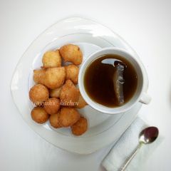 A picture of Puff puff with black tea🍵.