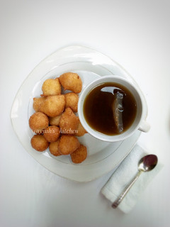 A picture of Puff puff with black tea🍵.