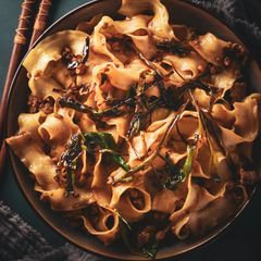 A picture of Pork & Spring Onion Noodles.