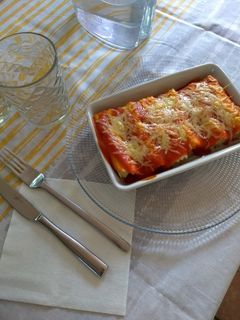 Una foto de Canelones gratinados de jamón