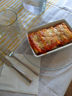 Una foto de Canelones gratinados de jamón
