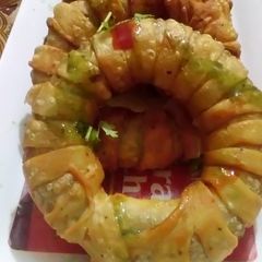 A picture of Chicken Potato donut samosa.