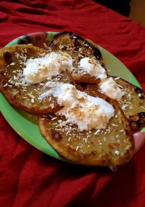A picture of Wheat flour jaggery pancakes.