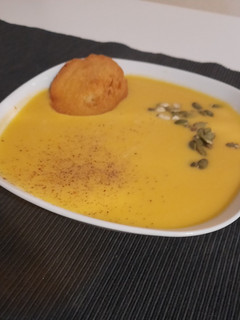 Una foto de Crema de calabaza y queso