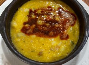 Una foto de Porotos Granados con Mazamorra