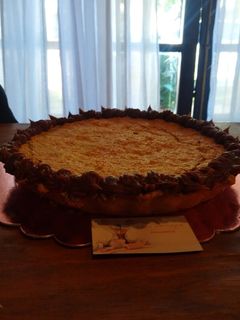 Una foto de Tarta de coco y dulce de leche