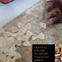 A picture of Making fresh pasta(spaghetti).