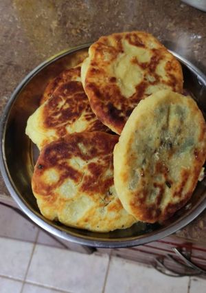 A picture of Ground beef filled pancakes.