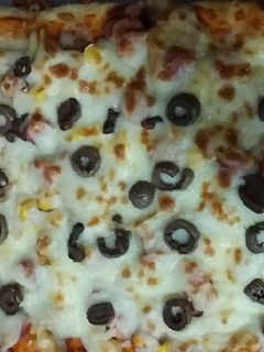 صورة لوصفة 😋 بيتزا بطاووق على طريقة رشا 😋