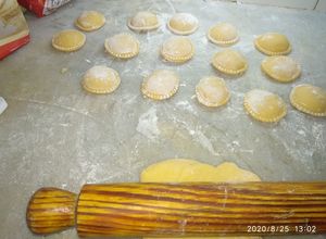 Una foto de Sorrentinos de jamón y queso