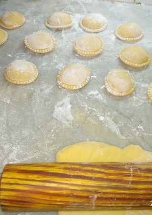 Una foto de Sorrentinos de jamón y queso