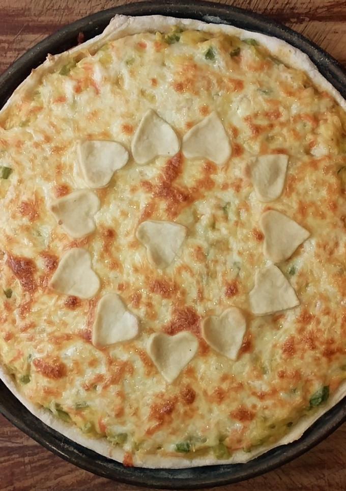 Una foto de Tarta de puerro, zapallitos y zanahoria