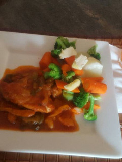 Una foto de Pollo con salsa ketchup