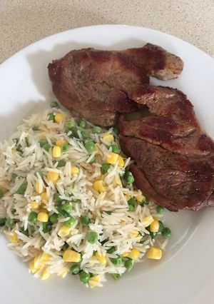 A picture of Coriander and Veg Rice with Peppered Lamb Steaks.