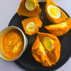 Okpa & Egg (Bambara Nut Pudding): Nigeria's Original Street Food Wrap A picture of Okpa & Egg (Bambara Nut Pudding): Nigeria's Original Street Food Wrap.
