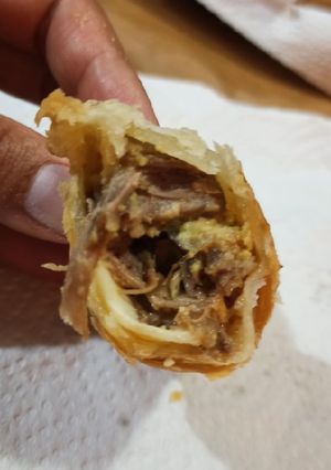 Una foto de Empanadas de bondiola braseada