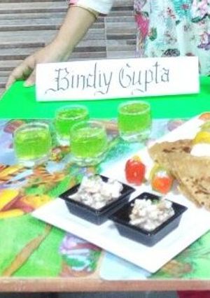 A picture of Pizza paratha with wardrof salad.