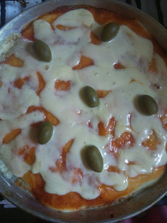 Una foto de Pizza con masa batida