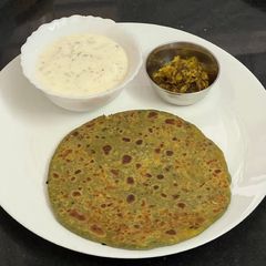 A picture of Healthy & Protein Pack Palak Paneer Paratha 🫓.
