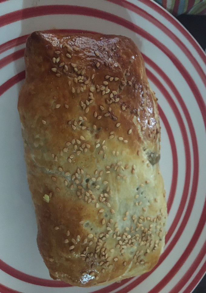 Una foto de Salmón hojaldrado con espinacas