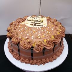 A picture of Chocolate whipped cream cake.