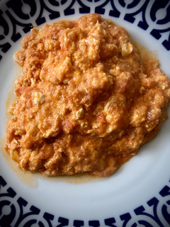 Una foto de Tomate frito con huevo