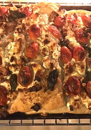 A picture of California Farm Goat Cheese Basil Tomato Tart.