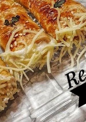 صورة لوصفة مونشو بالعجينة المورقة وكريمة الجبن 🧀