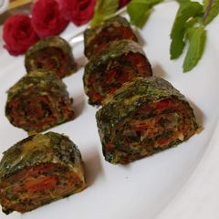 A picture of Savoury spinach roulade.