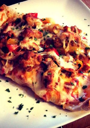 A picture of Topped Enchilladas.