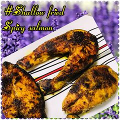 Shallow fried spicy salmon fish A picture of Shallow fried spicy salmon fish.