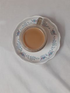 अदरक,तुलसी वाली चाय (Adrak tulsi wali chai recipe in Hindi) रेसिपी मुख्य फोटो